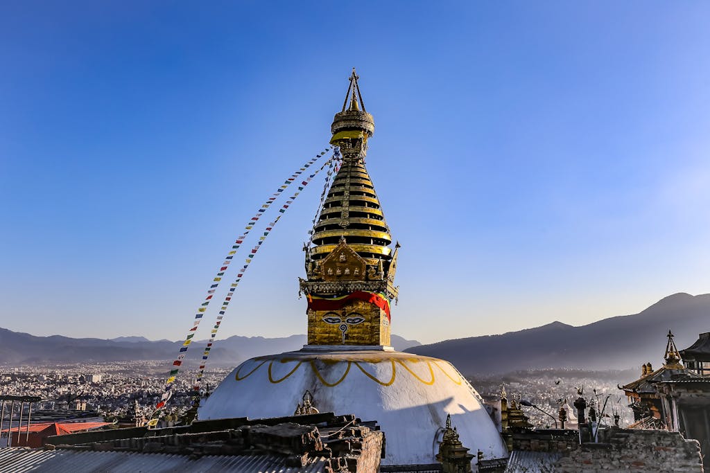 Gold and White Temple Under the Blue Sky